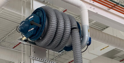 a hose reel-style exhaust removal system