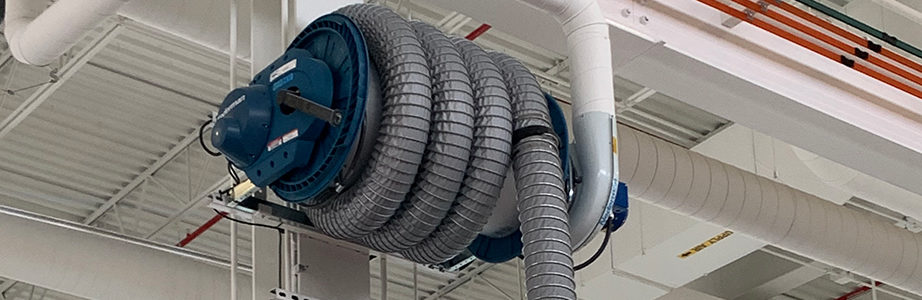 a hose reel-style exhaust removal system