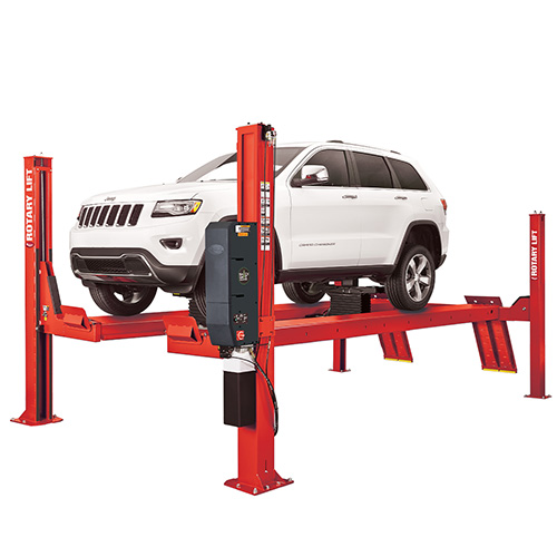 A red Rotary SM014 lift holding a standard white SUV